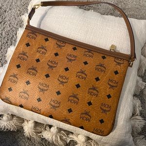 MCM small shoulder purse. Perfect hardware and interior. Smells like brand new!